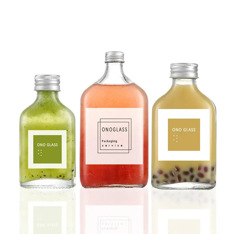 Wholesale 250ml 350ml 500ml Eco-friendly Flat Round Glass Bottles for Tequila Coffee & Juice with Silver Screw Caps