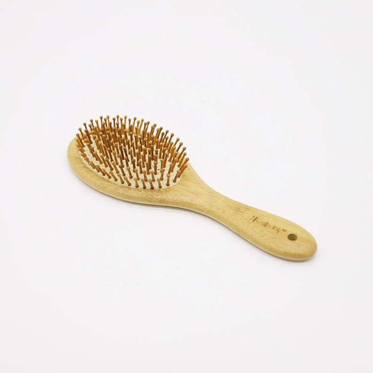 Eco-friendly Oval Shape Wood Bamboo Hair Brush Paddle Cushion Comb for Hair Detangling Massage Brush Wholesale Custom