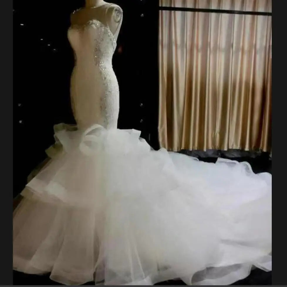 2023 Africa Plus Size Mermaid Wedding Dresses Sheer Lace Appliques Illusion Bridal Gowns Tiered Ruffles Sleeveless Wedding Robe