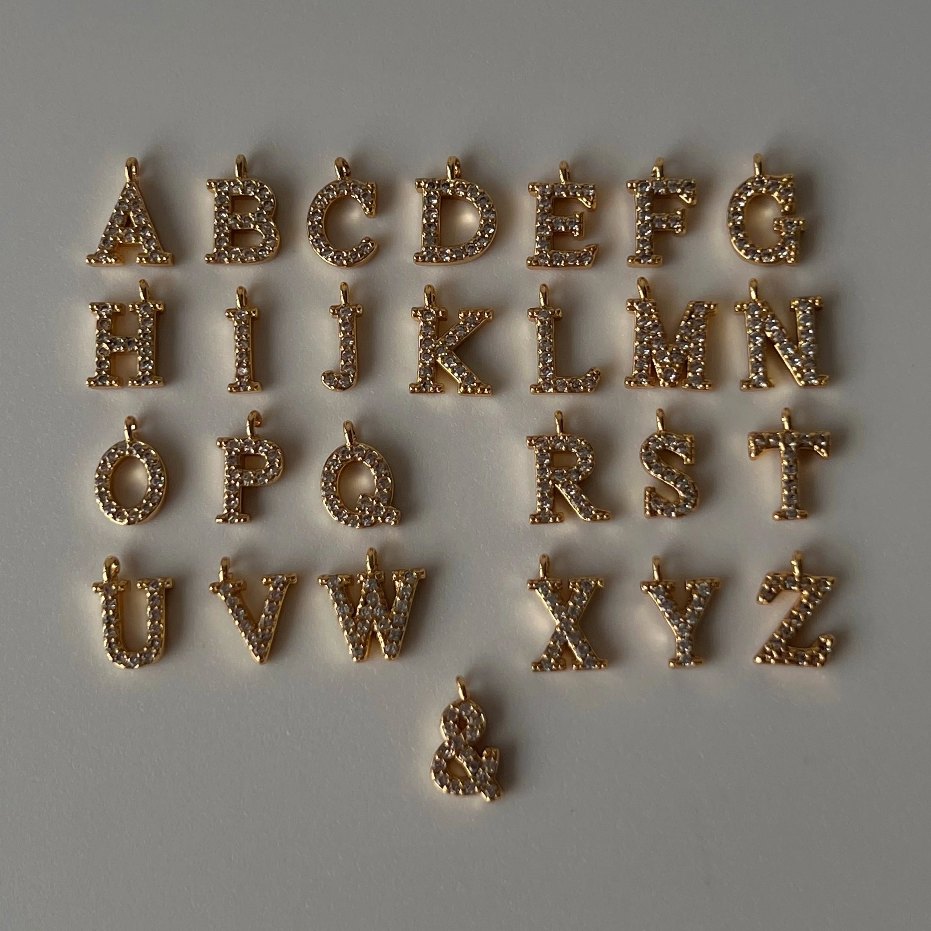 2026 Dazan New Ins Pendant Gold Plated Iced Out Super Shine Initial 26 Alphabet Letter Diy Cubic Zirconia Wholesale Pendant Set