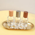 Custom logo 30ml 50ml Transparent Color Round Shape Wooden Lid Empty Thick Bottom Glass Spray Brand Name Perfume Bottles