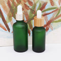 Frosted Green Round Bottle Serum 50 ml with Bamboo Dropper Lid