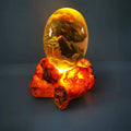 Hot Selling Light up Dinosaur Egg Resin Decoration Crafts Souvenir Gifts Glowing Lava Dragon Eggs With Light Base Stand