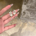 Charming Women's Bow Pearl Light Luxury Earrings - 67# Cream White Double Flower Zircon Tassel Ear Studs MegaBDM