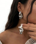 Liquid Lava Metal Simple Fashion Geometry Pattern Irregular Pleated Leaf-shaped Stud Earrings - Silver MegaBDM