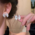 Women's Blue Flower For Spring Light Luxury High-grade Niche Stud Earrings - 8# Silver Pleated Bow Texture Pinch Pleated Ear Studs MegaBDM
