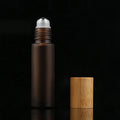 Wholesale Hot Sale Good Quality Amber Essential Oils Roll-on Container 10ml Clear Glass Roller Bottle with Bamboo Cap
