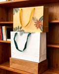LCustom Luxury Christmas Orange Ribbon Handle Reusable Boutique Paper Bag Screen Printed for Clothes