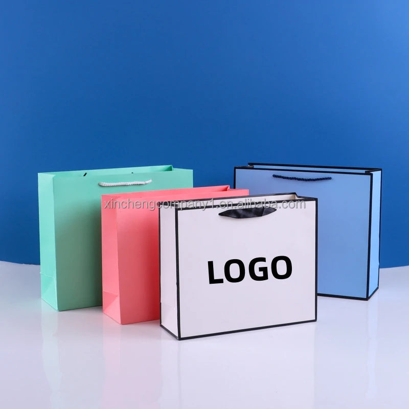 Wholesale Sustainable Ribbon Handle Gift Carrier Packaging Custom Logo Print Design Luxury Kraft Paper Shopping Bag
