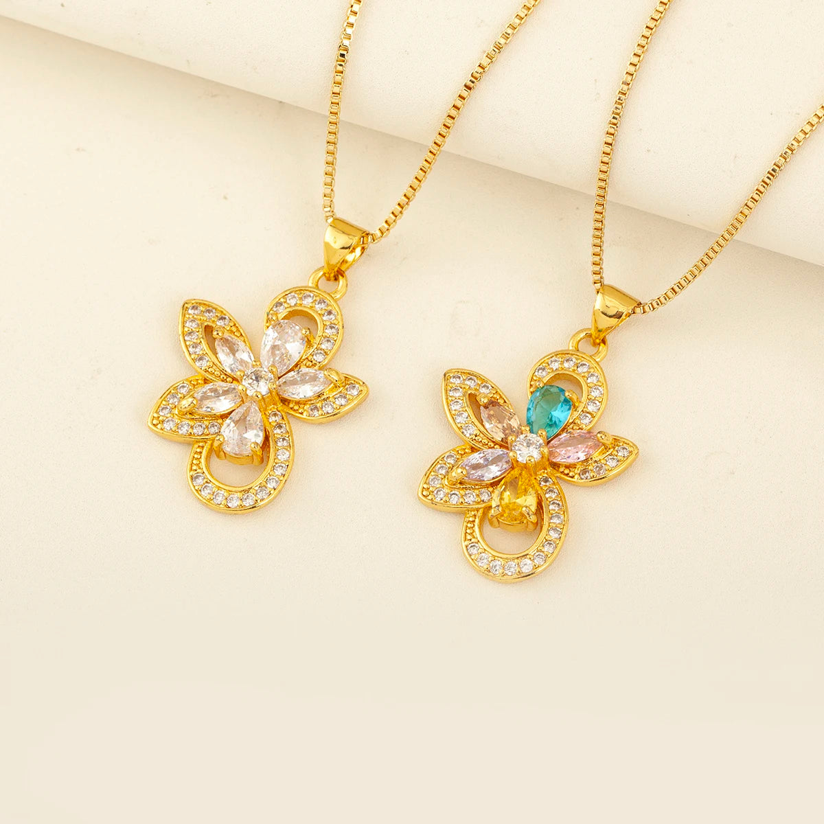 QIKU Gold Plated Butterfly Flower Pendant Necklaces for Women Sparkling Crystal Inlaid Hollow Design Jewelry Daily Wear