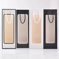 Wholesale Luxury Art Paper Wine Gift Bags with Embossing Custom Packaging with Clear Window Recyclable for Candle & Craft Use