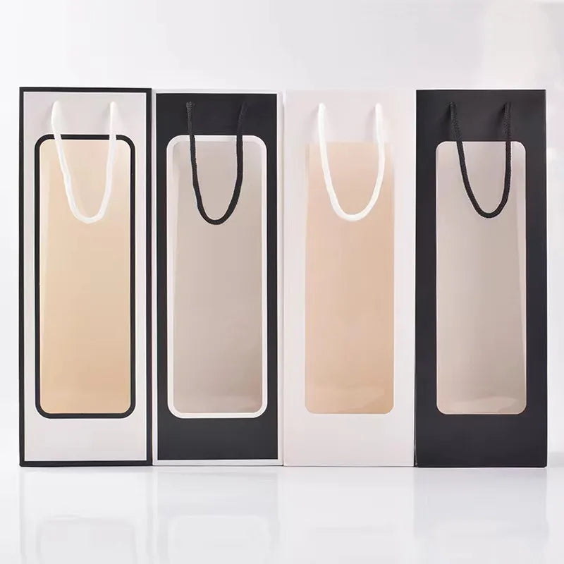 Wholesale Luxury Art Paper Wine Gift Bags with Embossing Custom Packaging with Clear Window Recyclable for Candle & Craft Use