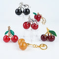 Newly Keychains Cherry Fruit Style 3D Crystal Keychain Exquisite Luxury Fashionable Light Bag Pendant Accessory for Women