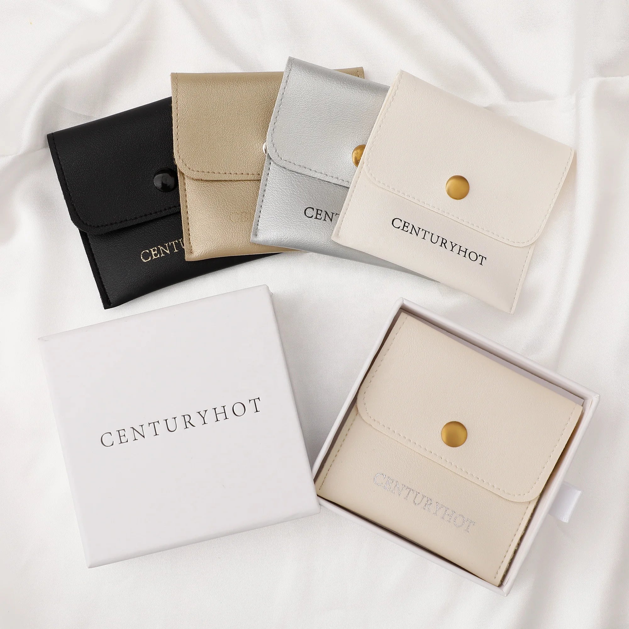 PUPPYSEW Wholesale White PU Leather Jewelry Pouch Bag  Jewelry Packaging Bag With Sanp Button Necklacering Pouch  With logo