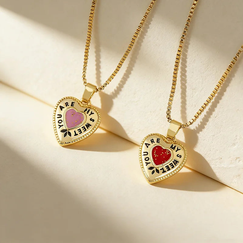 QIKU Copper 18K Gold-Plated Pendant Necklace Heart Letter Design Glamorous Bohemian Jewelry Featuring Zircon Stone for Women Men