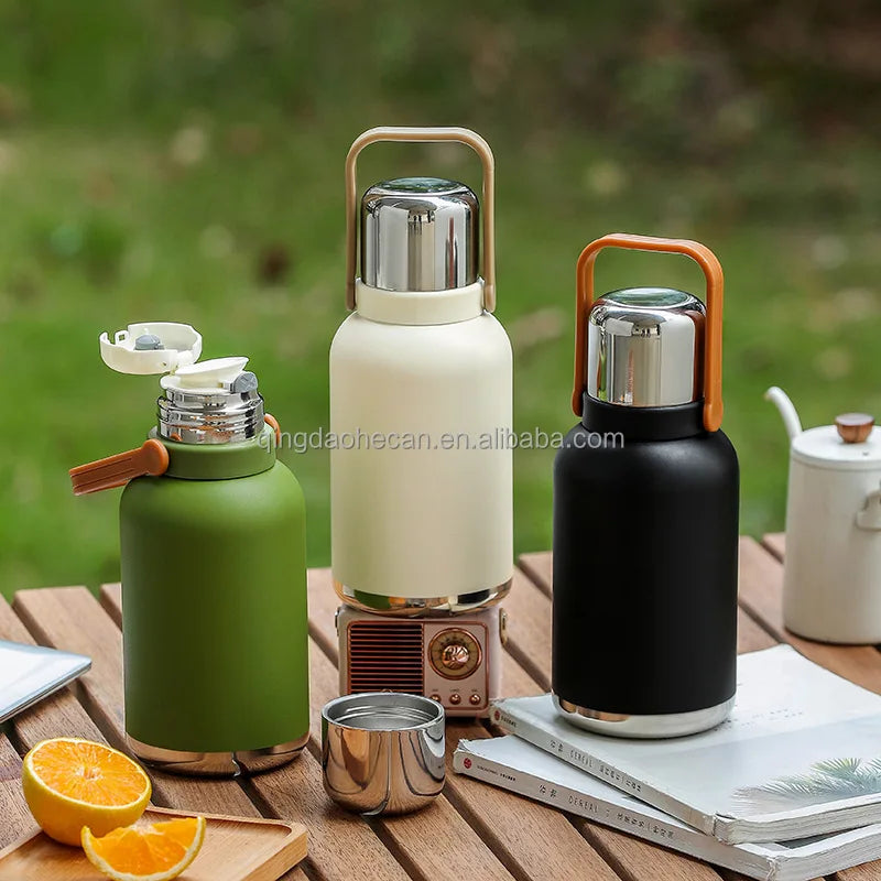 Double Wall  Carry Handle  Stainless Steel Bottles Water Eco-friendly Ice Cube Water Bottle with Custom logo  with  Carrying Bag
